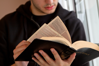 Man reading bible